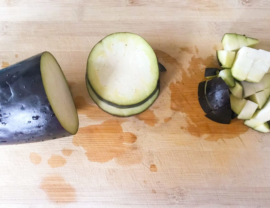 Cut eggplant on cutting board