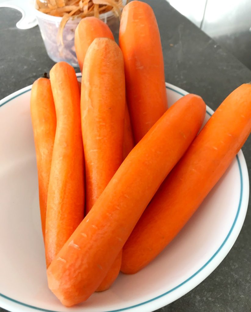 Peeled carrots in bowl