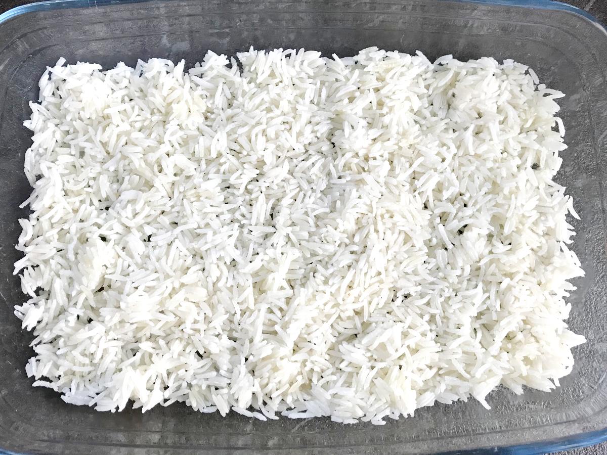 Spread rice evenly in casserole form