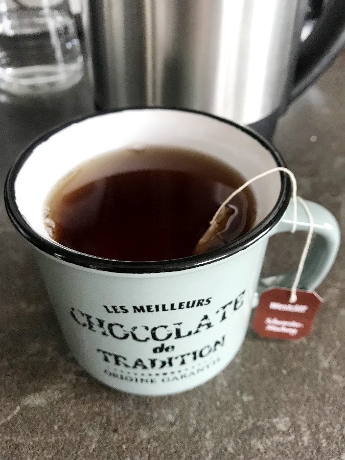 Black tea brewed in cup