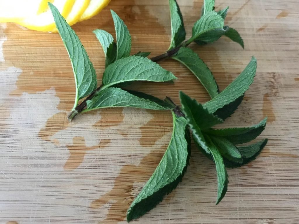 Mint leaves on cutting board