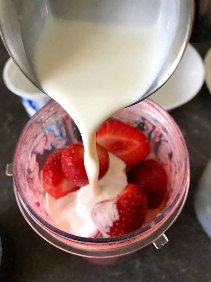 Add cream to blender and blend together