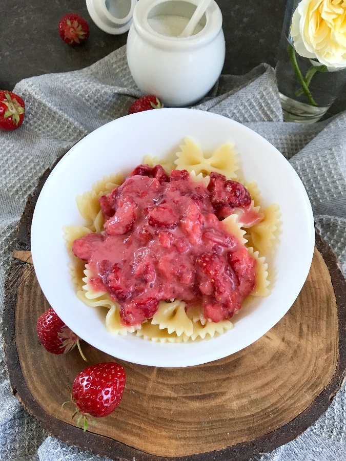 Farfalle bow tie pasta served with strawberry sauce