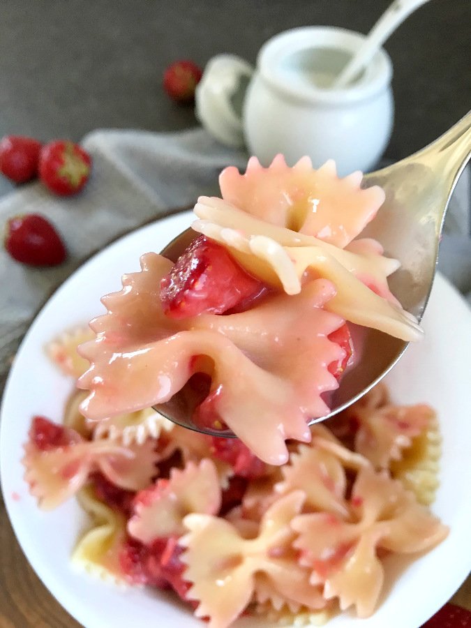 Farfalle Pasta with Strawberry sauce on a spoon