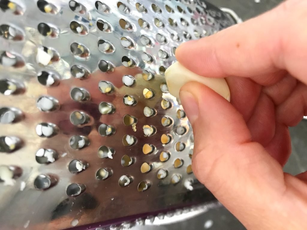 Garlic clove grated on a grater