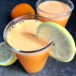 Pineapple carrot orange juice in a glass