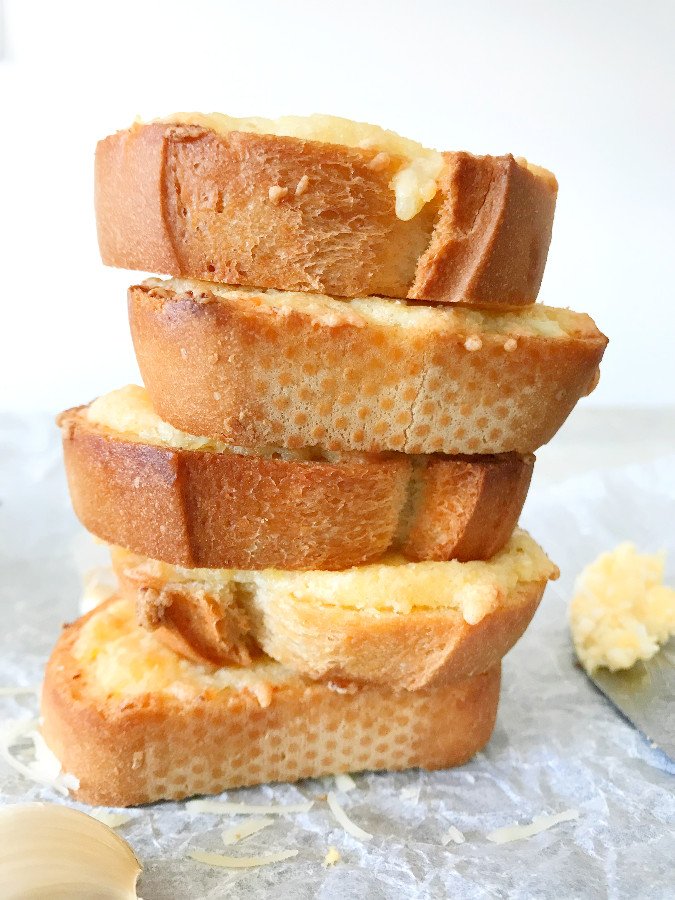 Egg and Cheese Crostini served stacked on the top of each other.