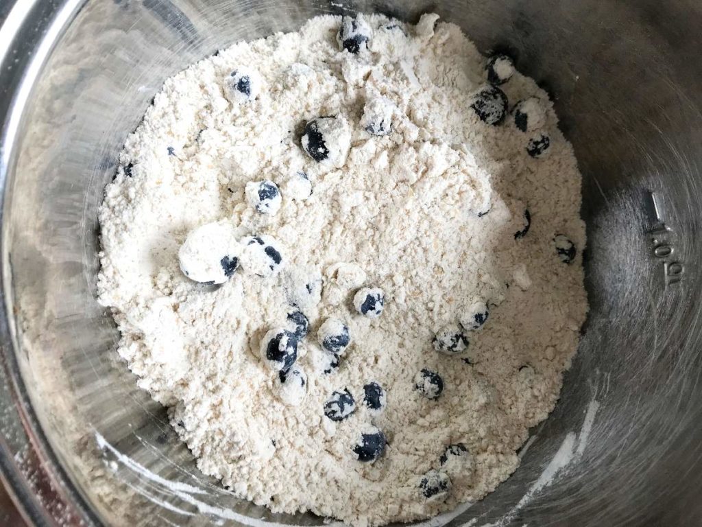 Blueberries and sugar mixed with flour