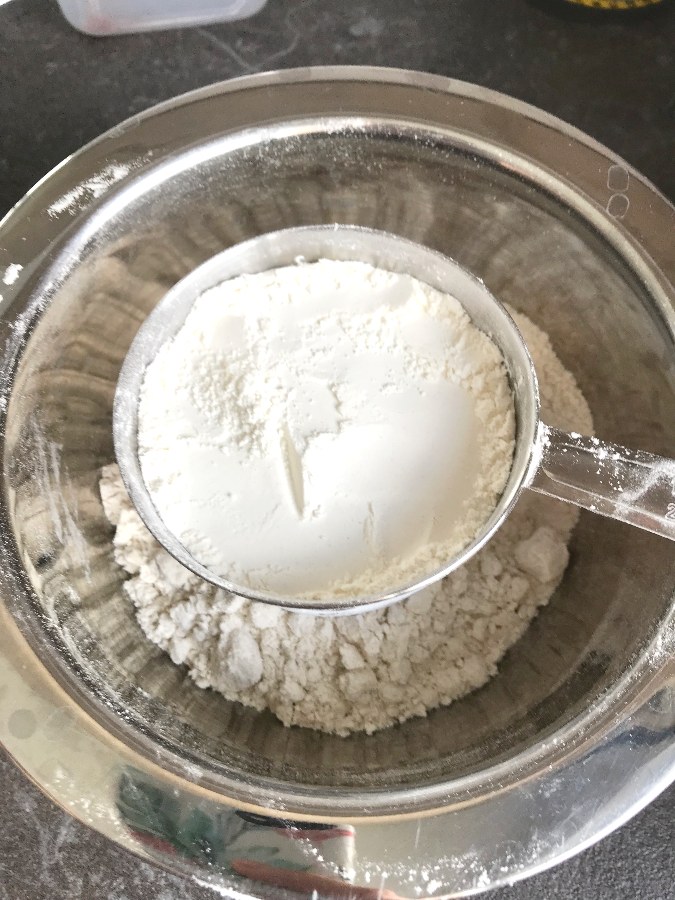 Flour in a measuring cup