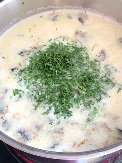 Chopped dill and basil added to the chicken wild rice and mushroom soup.