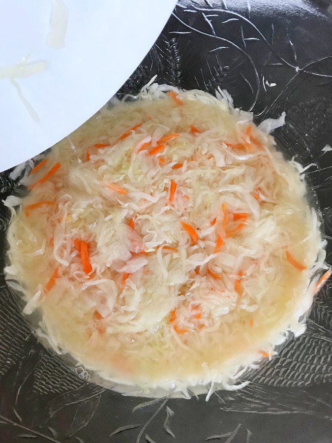 Plate covering sauerkraut removed