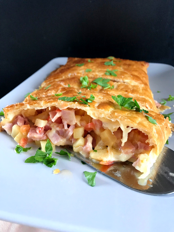 Ham and Cheese Puff Pastry with Apples on a serving platter.