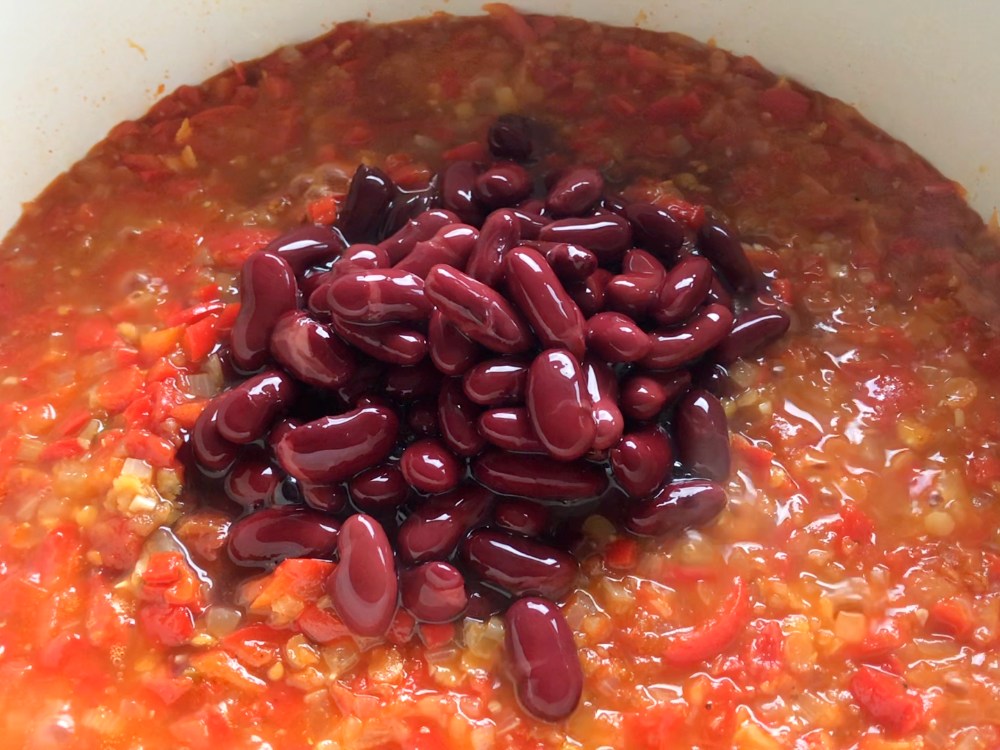 Red kidney beans added to vegetable chili