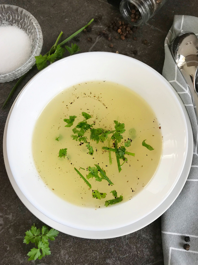 Chicken broth served in a bowl