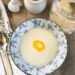 Cream of Wheat porridge hot cereal served in a bowl with a sliver of melting butter.