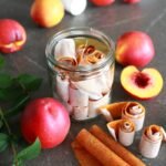 Homemade fruit roll ups in a glass.