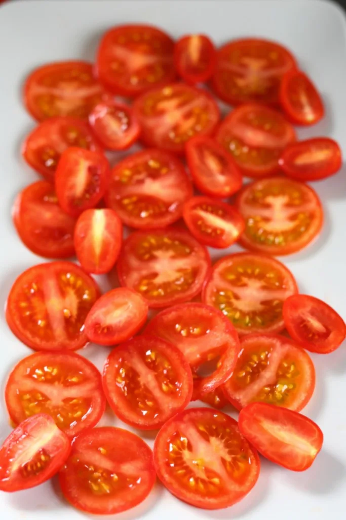 Sliced tomatoes on a platter.