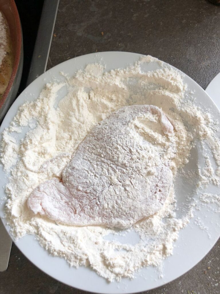 Chicken breast dredged in flour