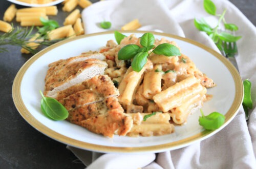 Marry Me Chicken Pasta served on a plate and garnished with Basil.