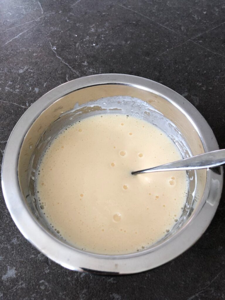 Belgian waffle wet ingredients in a bowl