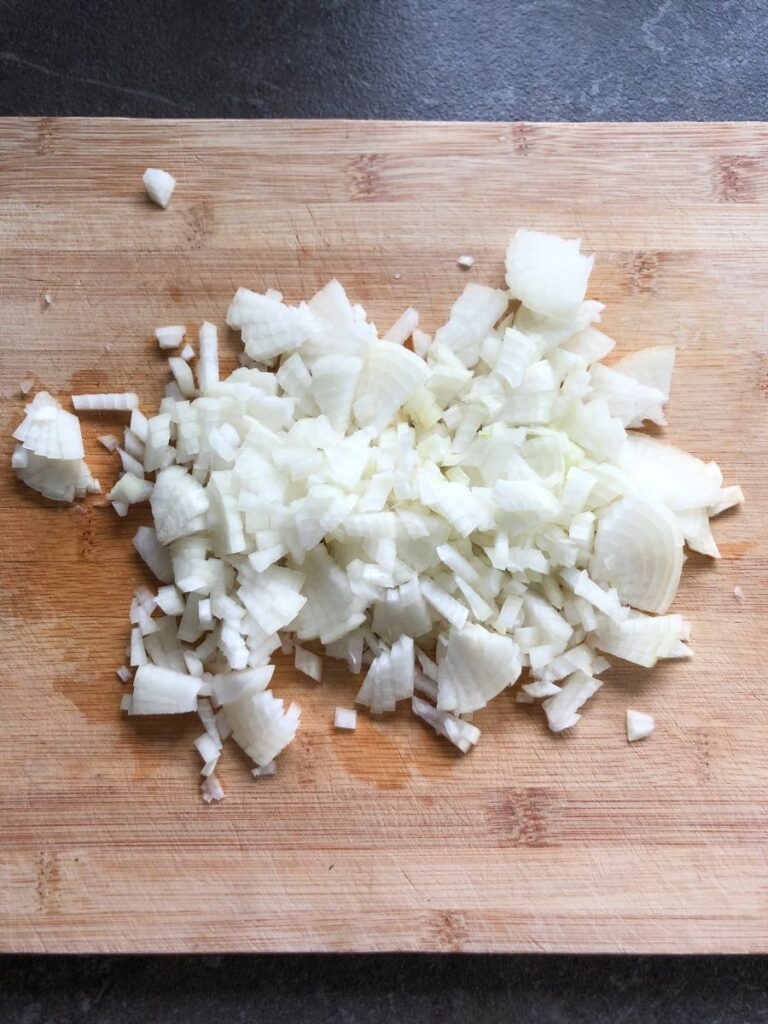 Diced onions on a cutting board