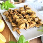 Grilled mushrooms on a platter.