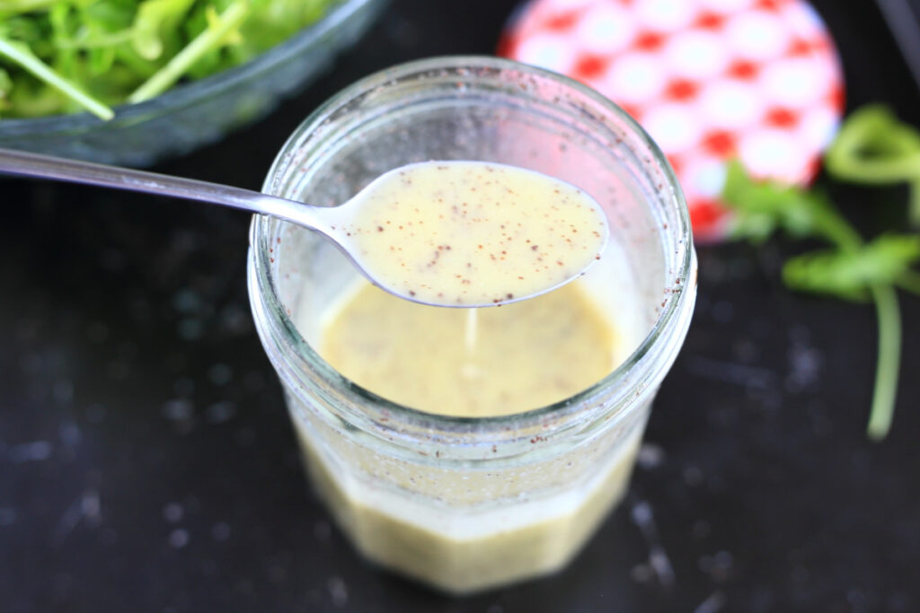 Poppy Seed dressing with honey in a jar