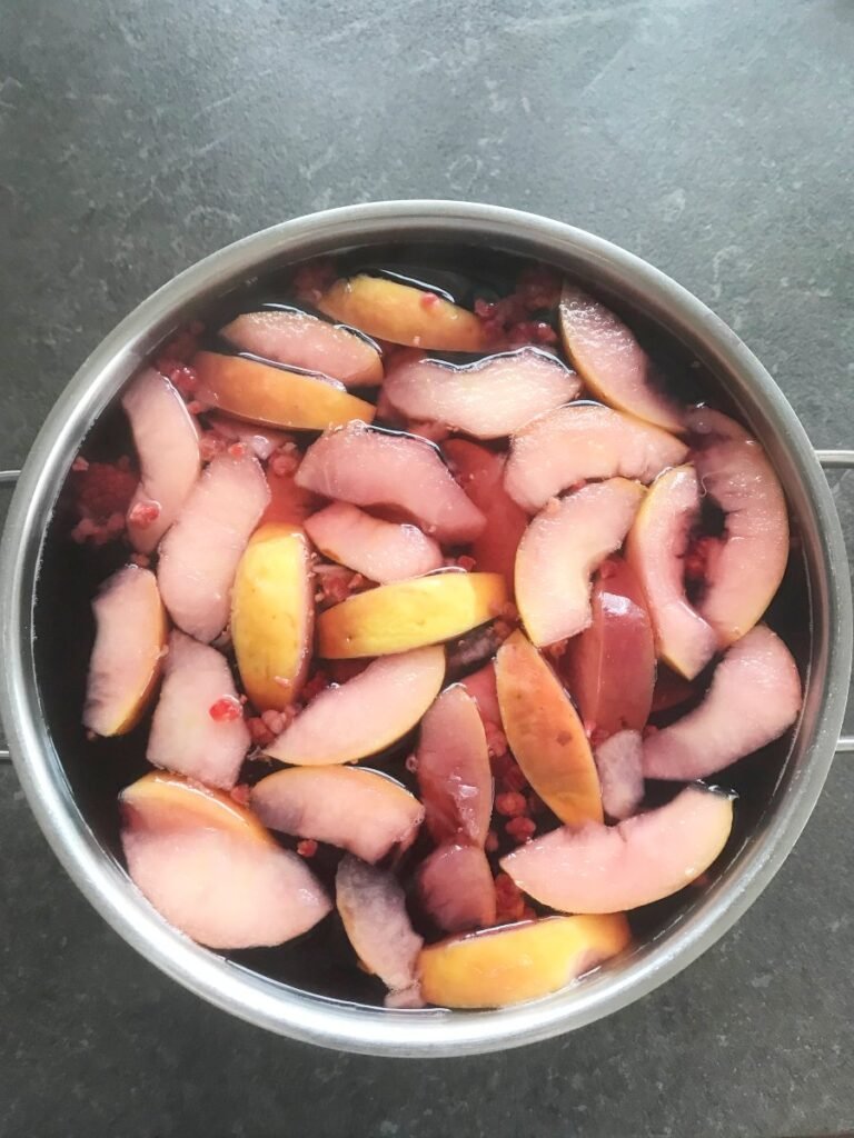 Cooked kompot in a pot