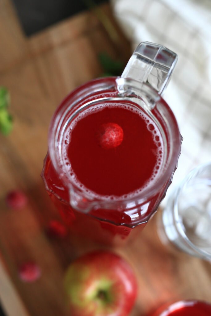 Apple raspberry Kompot in a pitcher