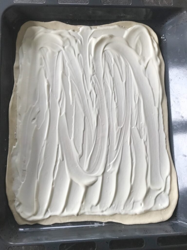 Creme Fraiche spread on dough