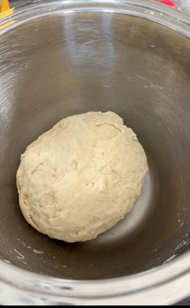 Flammkuchen dough in mixing bowl