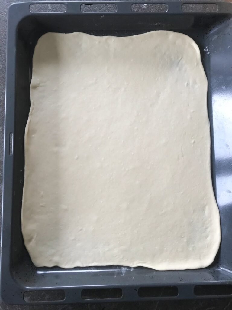 Rolled out dough on baking sheet